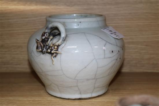 Three Chinese porcelain jars, Qing Dynasty - one crackleglaze, a blue and white and a famille rose example tallest 14cm